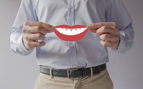 Man holding digital smile