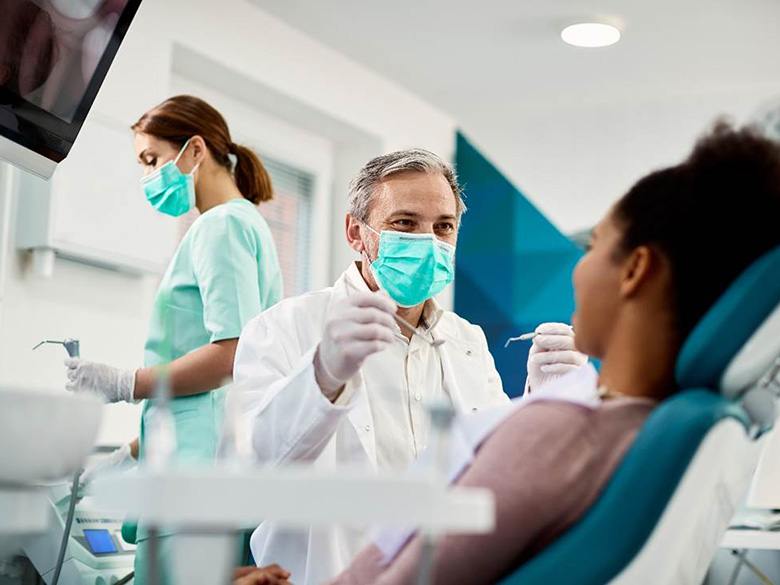 Dentist preparing for a checkup