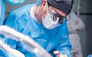 Dentist performing surgery